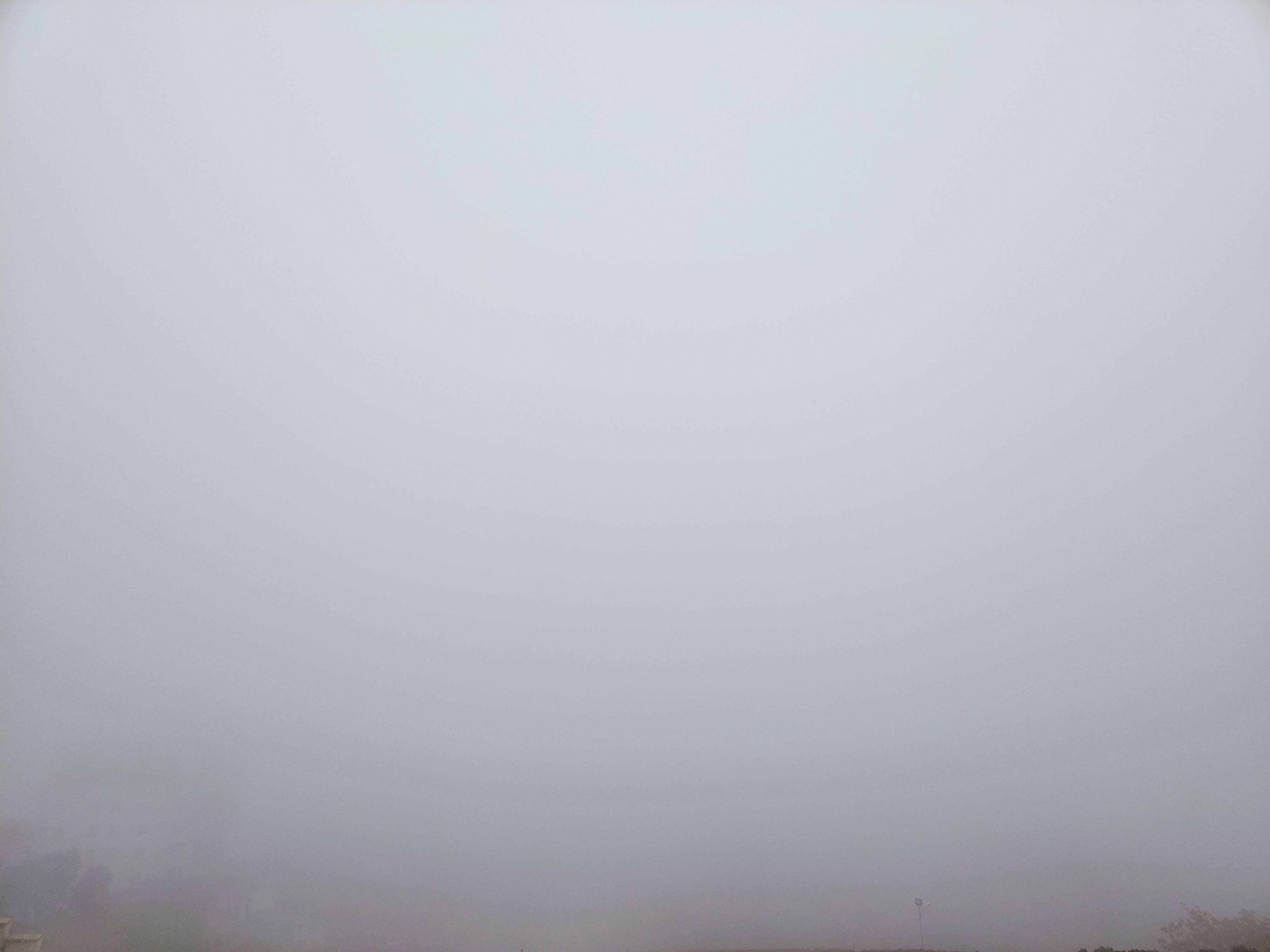 Yerevan city foggy panorama from Cascade