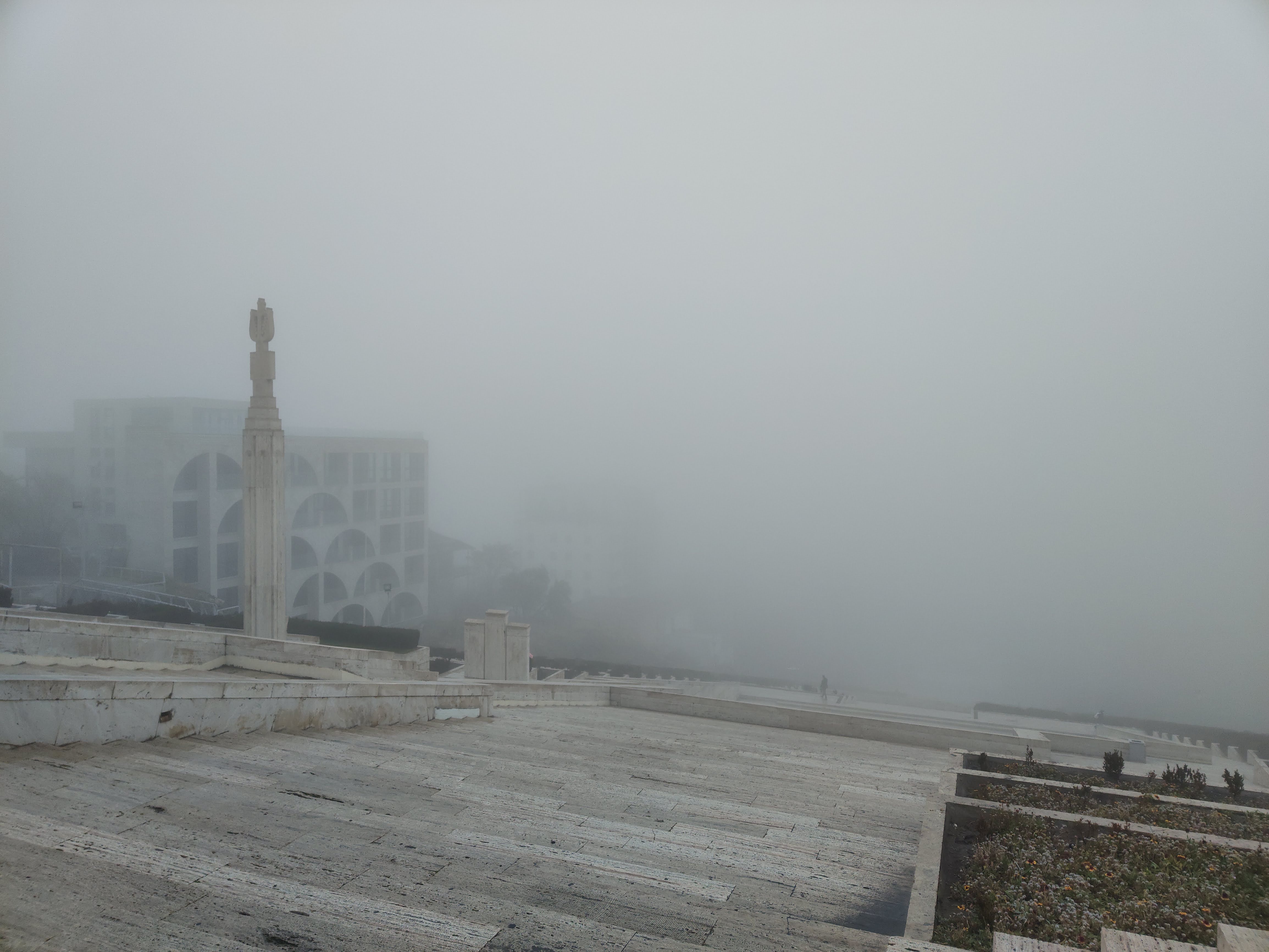Yerevan city foggy panorama from Cascade
